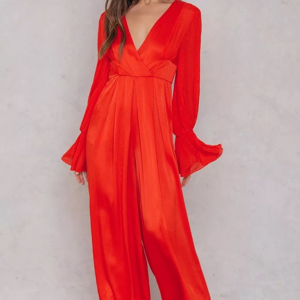 Free People Orange Jumpsuit with Plunging V-Neck and Wide-Leg Pants